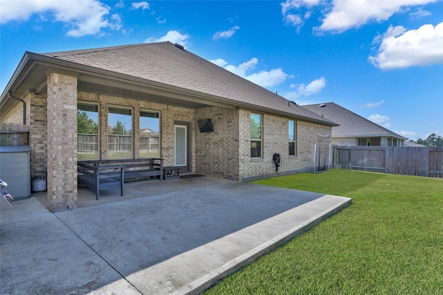 11510 Gingerland Dr, Conroe, TX 77304 - back of house featuring a patio area and brick siding