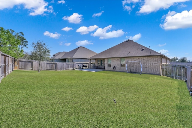 11510 Gingerland Dr, Conroe, TX 77304 - view of yard with a patio