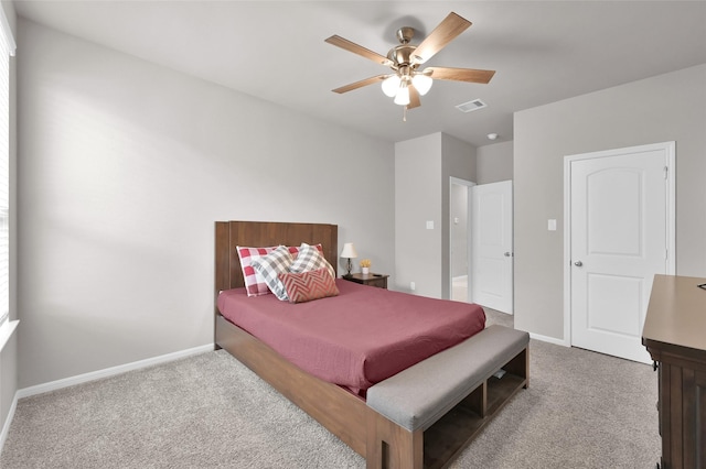 11510 Gingerland Dr, Conroe, TX 77304 - carpeted bedroom with baseboards and a ceiling fan