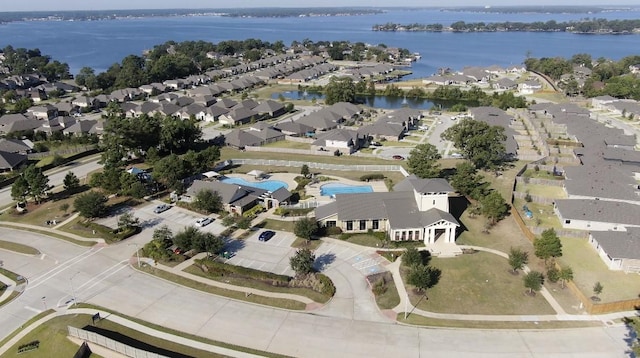 11510 Gingerland Dr, Conroe, TX 77304 - aerial overview of property's location featuring a nearby body of water, nearby suburban area, and a pool