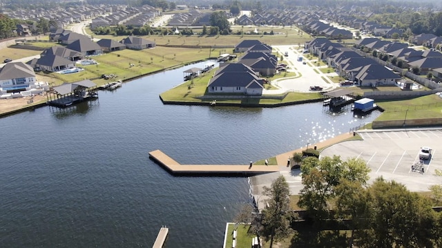 11510 Gingerland Dr, Conroe, TX 77304 - aerial view of residential area with a large body of water