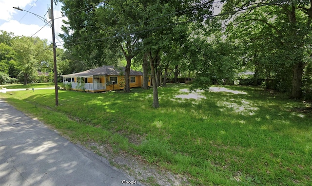 7418 Cora St, Houston, TX 77088 - view of front of house featuring a porch and a front yard