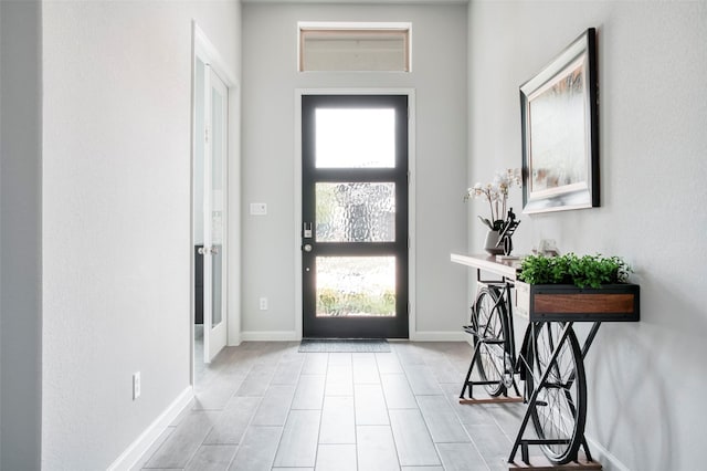 30142 Gold Finch Pl, Fulshear, TX 77441 - foyer entrance featuring healthy amount of natural light and baseboards