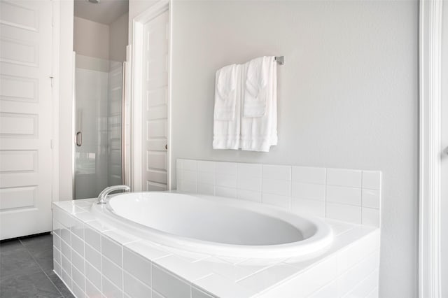 30142 Gold Finch Pl, Fulshear, TX 77441 - bathroom with a shower stall, a bath, and tile patterned floors