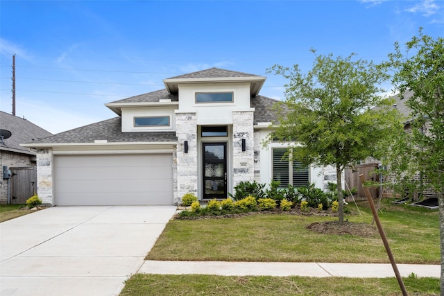 30142 Gold Finch Pl, Fulshear, TX 77441 - view of front of property featuring a shingled roof, driveway, stone siding, stucco siding, and a garage