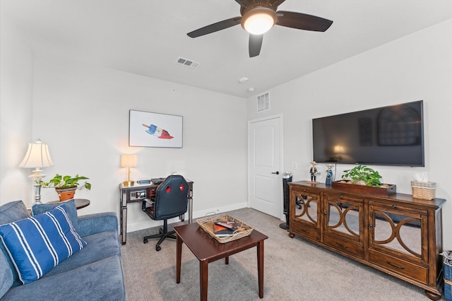 6804 Westview Dr Unit 2207, Houston, TX 77055 - living area with ceiling fan, carpet, a desk, and baseboards