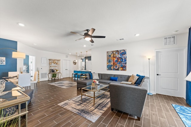 6804 Westview Dr Unit 2207, Houston, TX 77055 - living room with a ceiling fan, wood finish floors, baseboards, and recessed lighting
