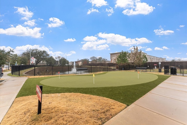 6804 Westview Dr Unit 2207, Houston, TX 77055 - view of property's community featuring an area to practice putting and fence