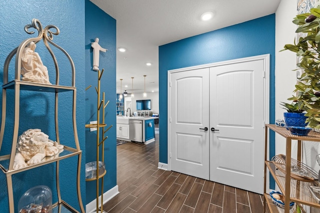 6804 Westview Dr Unit 2207, Houston, TX 77055 - corridor with a textured wall, dark wood-style flooring, and recessed lighting