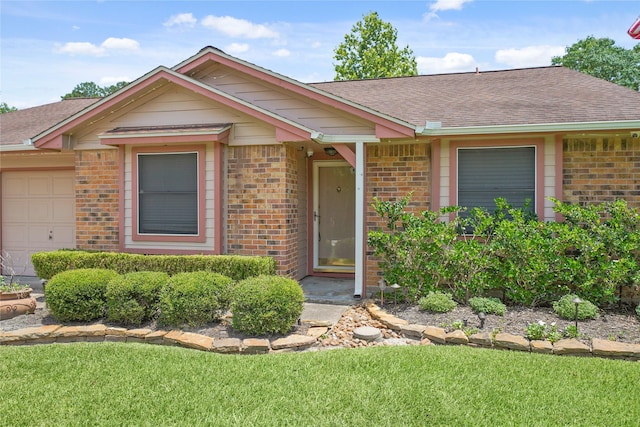 21410 Glenbranch Dr, Spring, TX 77388 - single story home featuring brick siding, an attached garage, a shingled roof, and a front yard