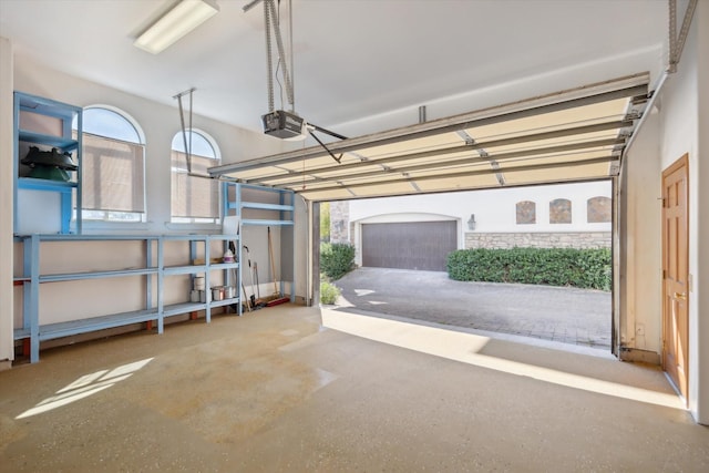 garage featuring a garage door opener