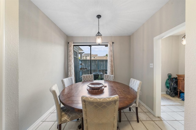1924 Clipper Ct, Willis, TX 77318 - dining area featuring baseboards and light tile patterned flooring