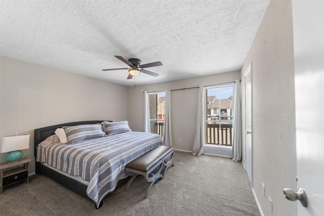 1924 Clipper Ct, Willis, TX 77318 - carpeted bedroom with access to outside, a ceiling fan, a textured ceiling, and baseboards