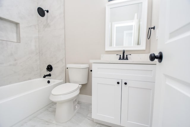 bathroom featuring toilet, marble look tile flooring, vanity, tub / shower combination, and baseboards