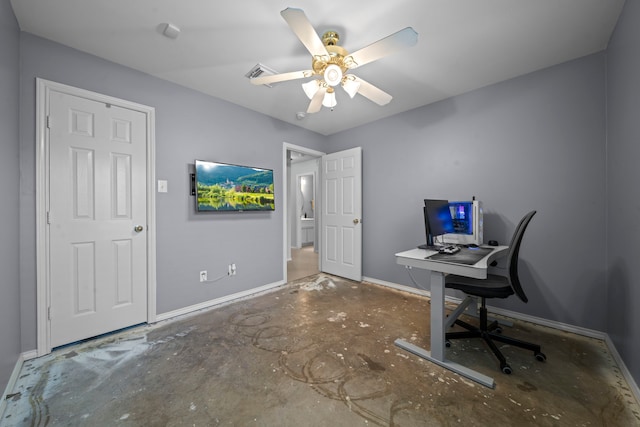 unfurnished office with unfinished concrete floors, baseboards, and a ceiling fan