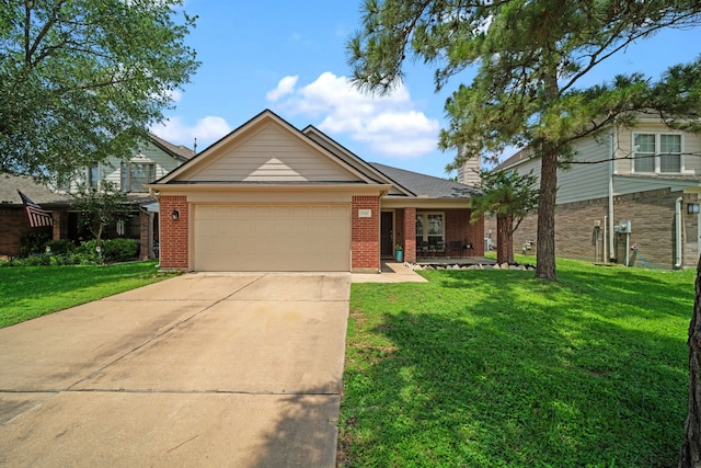 single story home featuring brick siding, an attached garage, driveway, and a front lawn
