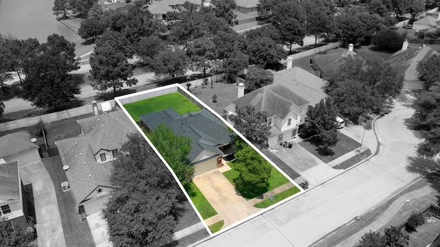aerial perspective of suburban area featuring property boundaries highlighted