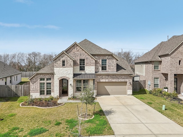 531 Campbell Dr, League City, TX 77573 - french country style house with brick siding, driveway, a shingled roof, an attached garage, and stone siding