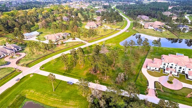 1 Steeldust Ct, Tomball, TX 77377 - aerial overview of property's location featuring a nearby body of water and nearby suburban area