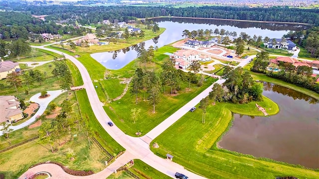 1 Steeldust Ct, Tomball, TX 77377 - aerial perspective of suburban area featuring a nearby body of water