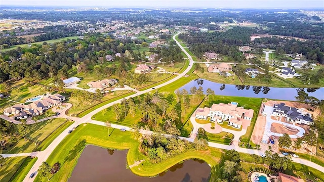 1 Steeldust Ct, Tomball, TX 77377 - aerial view of property's location with a large body of water and nearby suburban area