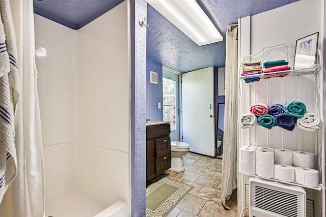 5005 Avenue N Rear Ave N, Rear, Galveston, TX 77551 - bathroom with toilet, curtained shower, vanity, and stone finish flooring