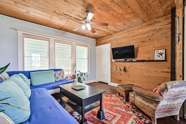 5005 Avenue N Rear Ave N, Rear, Galveston, TX 77551 - living area featuring wood ceiling, a ceiling fan, wood walls, wood finished floors, and baseboards