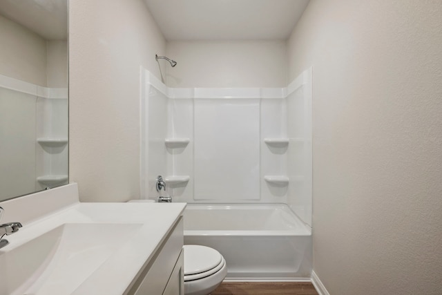 425 Tejas Trl, Waller, TX 77484 - full bath with wood finished floors, toilet, vanity, shower / bath combination, and a textured wall