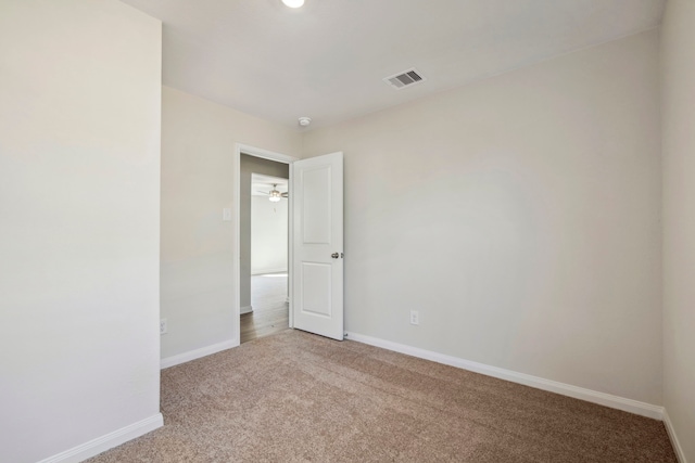 425 Tejas Trl, Waller, TX 77484 - carpeted spare room featuring baseboards and ceiling fan