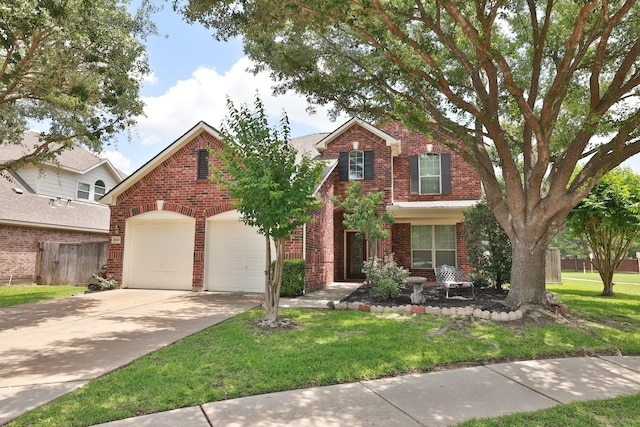 10606 Maidstone Manor Ct, Spring, TX 77379 - traditional-style home with brick siding, an attached garage, and driveway