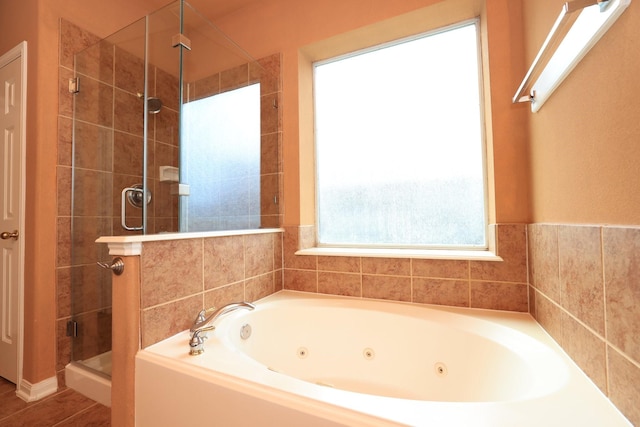 10606 Maidstone Manor Ct, Spring, TX 77379 - bathroom with a stall shower and a jetted tub