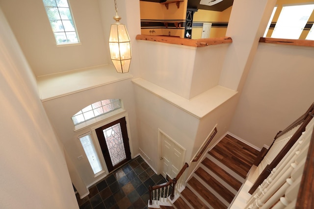 10606 Maidstone Manor Ct, Spring, TX 77379 - entrance foyer with baseboards and stairs