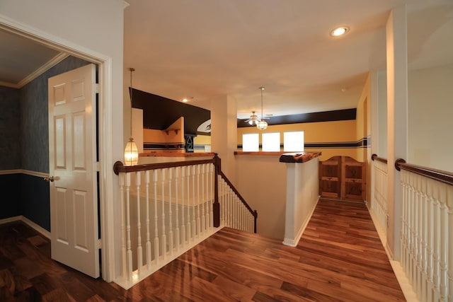 10606 Maidstone Manor Ct, Spring, TX 77379 - hall featuring an upstairs landing, ornamental molding, baseboards, wood finished floors, and a chandelier
