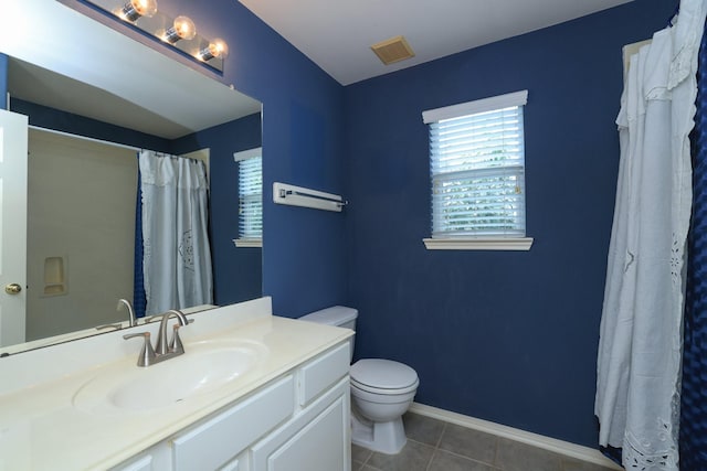 10606 Maidstone Manor Ct, Spring, TX 77379 - bathroom featuring toilet, tile patterned flooring, vanity, and baseboards
