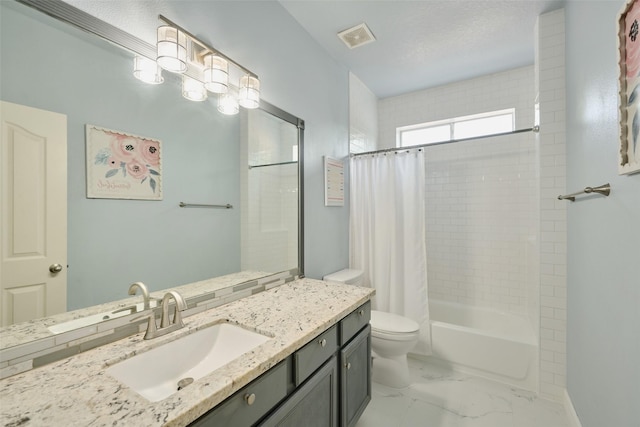 7503 Revelwood Dr, Magnolia, TX 77354 - bathroom with vanity, shower / bath combo, toilet, and marble finish floors