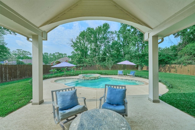 7503 Revelwood Dr, Magnolia, TX 77354 - view of swimming pool featuring a patio and a pool with connected hot tub