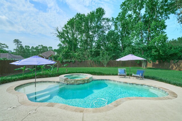 7503 Revelwood Dr, Magnolia, TX 77354 - view of swimming pool with a patio and a pool with connected hot tub