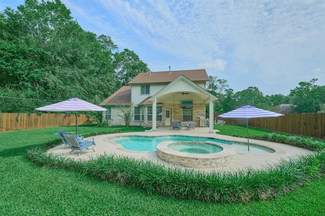 7503 Revelwood Dr, Magnolia, TX 77354 - view of swimming pool with a ceiling fan, a patio, and a pool with connected hot tub