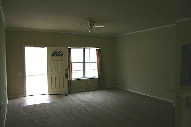 104 Longstreet Rd, Willis, TX 77378 - unfurnished living room featuring a ceiling fan, carpet, baseboards, and ornamental molding
