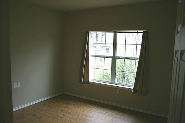 104 Longstreet Rd, Willis, TX 77378 - unfurnished room featuring wood finished floors and baseboards
