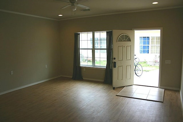 104 Longstreet Rd, Willis, TX 77378 - entryway featuring a ceiling fan, wood finished floors, ornamental molding, baseboards, and recessed lighting