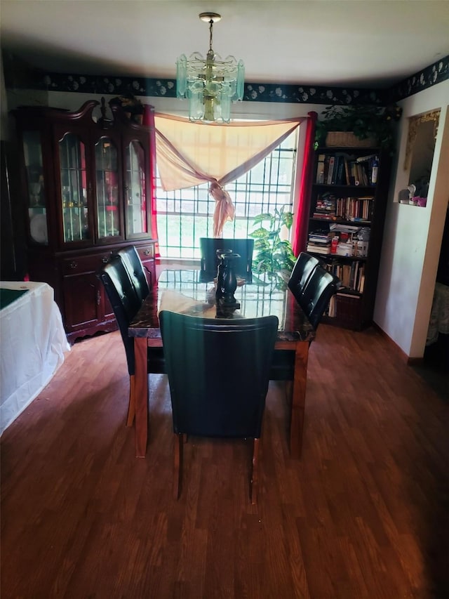 9411 Lomax St, Houston, TX 77093 - dining area with wood finished floors and a chandelier