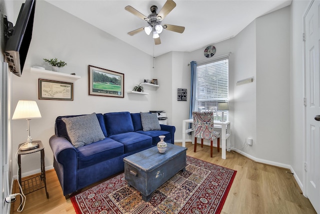 6607 Lake Woodlands Dr Unit 612, The Woodlands, TX 77382 - living area with light wood-style floors, ceiling fan, and baseboards