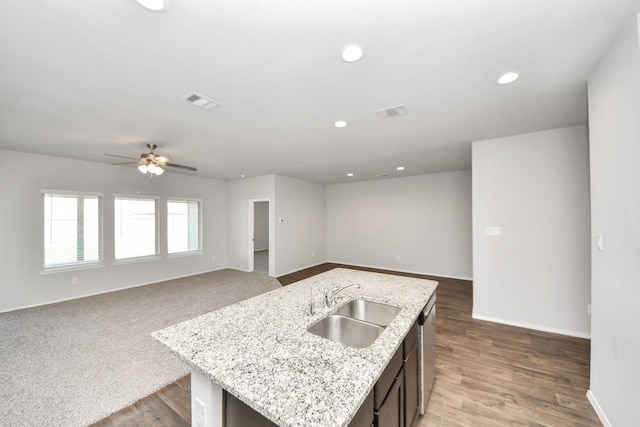 4727 Lombardy Fire Trl, Katy, TX 77449 - kitchen with a sink, open floor plan, stainless steel dishwasher, and recessed lighting