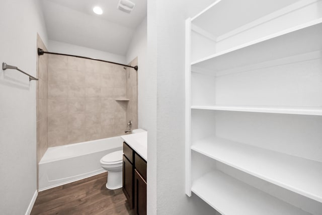 4727 Lombardy Fire Trl, Katy, TX 77449 - bathroom with wood finished floors, toilet, bathing tub / shower combination, and vanity
