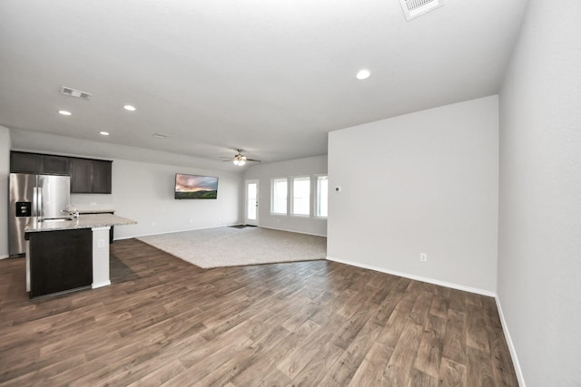 4727 Lombardy Fire Trl, Katy, TX 77449 - unfurnished living room with a ceiling fan, dark wood-type flooring, baseboards, and recessed lighting