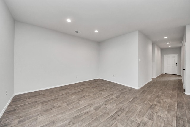 4727 Lombardy Fire Trl, Katy, TX 77449 - unfurnished room with wood finished floors, recessed lighting, and baseboards
