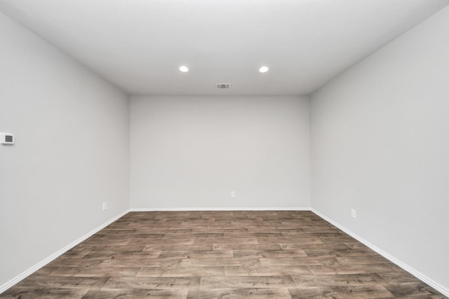 4727 Lombardy Fire Trl, Katy, TX 77449 - spare room with wood finished floors, recessed lighting, and baseboards