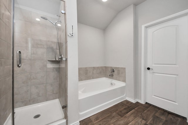 4727 Lombardy Fire Trl, Katy, TX 77449 - bathroom featuring a shower stall, wood finished floors, a bath, and recessed lighting