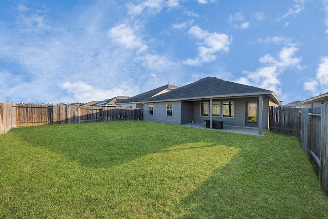 4727 Lombardy Fire Trl, Katy, TX 77449 - back of house featuring a patio area and roof with shingles